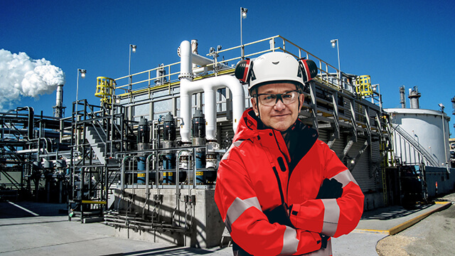 Engineer outside in front of wet surface air cooler system
